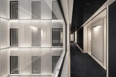a hallway of a building with white walls and windows at Seventy Barcelona in Barcelona