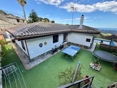 an overhead view of a house with a pool at CASA PARAÍSO PISCINA TRANQUILIDAD in Sant Cebrià de Vallalta