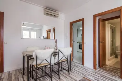 a dining room with a table and chairs at Nordic Apartment II Sagrada Familia in Barcelona