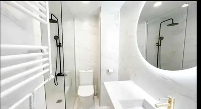 a bathroom with a toilet and a glass shower at Nordic Apartment II Sagrada Familia in Barcelona