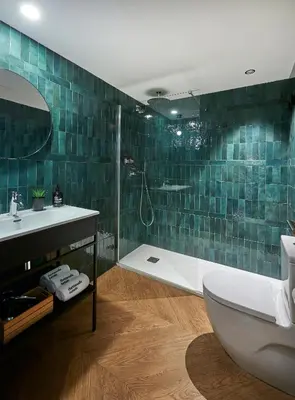 a bathroom with a toilet and a sink and a shower at The Moods Oasis in Barcelona