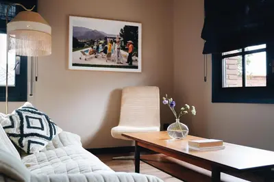 a living room with a couch and a coffee table at Isabella's House in Barcelona