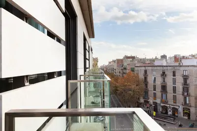 a balcony with a view of a city at Enjoy Apartments Maria in Barcelona