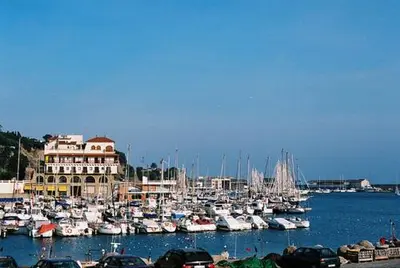 a bunch of boats are docked in a harbor at Hostal Portofino in Arenys de Mar