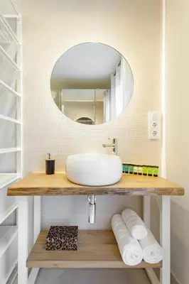 a bathroom with a sink and a mirror at Art House Paral-lel Sant Antoni in Barcelona