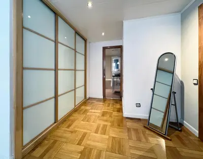a dressing room with a mirror and a ladder at Stay U-nique Apartments Diagonal in Barcelona