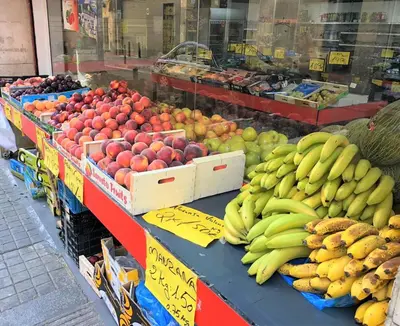 a display of fruits and vegetables in a market at Amazing Badalona Apartment With Terrace in Badalona