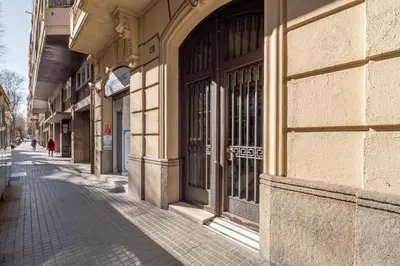 an empty street in front of a building at Sweett - Sepulveda in Barcelona