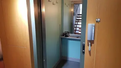 a bathroom with a counter and a phone in a room at Can Ramón in Caldes de Montbui