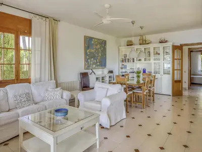 a living room with a couch and a table at Villa in Arenys de Mar with Sea View in Arenys de Mar