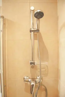 a shower with a shower head in a bathroom at Panier en Osier · Panier en Osier · Charming apartment w/private terrace 2min from sea in Vilassar de Mar