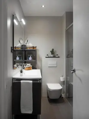 a bathroom with a white sink and a toilet at Stay Unique Apartments Aprestadora in Hospitalet de Llobregat