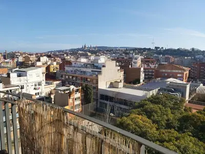 a view of a city from the top of a building at Casa Cosi - Sants in Barcelona