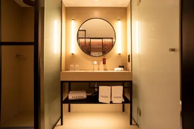 a bathroom with a sink and a mirror at Hotel Paxton Barcelona in Barcelona