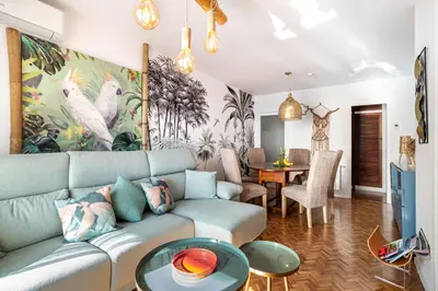 a living room with a couch and a table at LIANA SEAVIEW & BEACH - apartment in Montgat