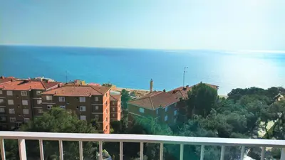a view from a balcony of buildings and the ocean at LIANA SEAVIEW & BEACH - apartment in Montgat