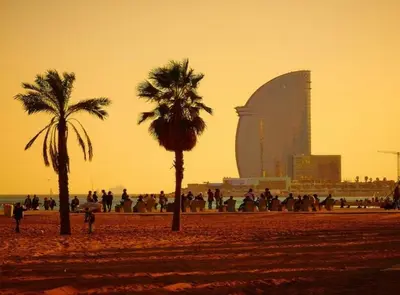 a group of people on a beach with palm trees at DUPLEX NEAR THE BEACH Barceloneta in Barcelona
