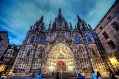 a large cathedral with people standing in front of it at FELIP - Spacious and quiet apartments & one with Terrace in Barcelona