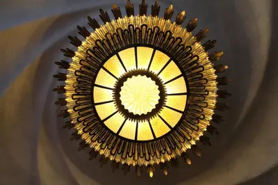 a chandelier hanging from a ceiling in a building at MIQUEL ANGEL - Apartments & one with private terrace in Barcelona