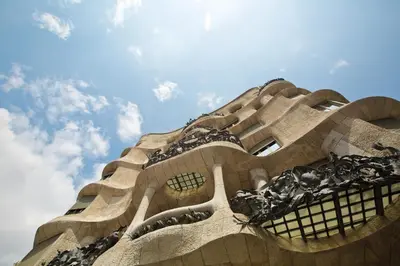 a building with a sky in the background at MIQUEL ANGEL - Apartments & one with private terrace in Barcelona