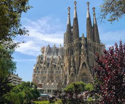 a large building with many spires on top of it at MIQUEL ANGEL - Apartments & one with private terrace in Barcelona