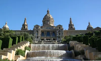 a fountain in front of a building with a waterfall at GIRONA - Modernist apartments next to Paseo de Gracia in Barcelona