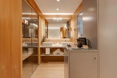 a bathroom with a sink and a mirror at Hotel Boutique Mirlo Barcelona in Barcelona