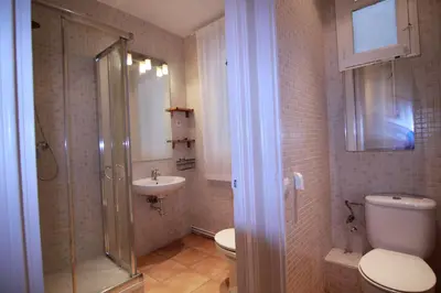 a bathroom with a shower and a toilet and a sink at CORSEGA - Apartment in the center of Barcelona in Barcelona