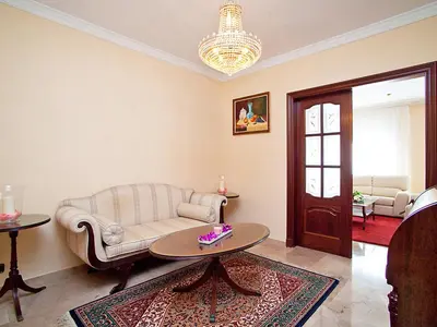 a living room with a couch and a table at Apartment Pg Gracia - Valencia by Interhome in Barcelona