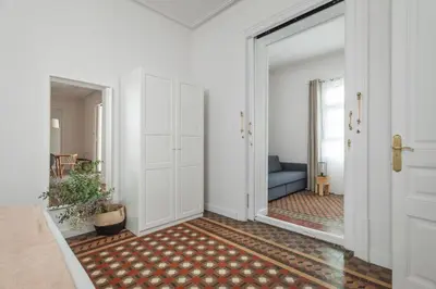 a hallway with a door leading to a living room at Flateli Pelayo H5 in Barcelona