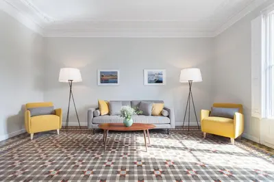 a living room with a couch and two chairs at Flateli Pelayo H5 in Barcelona