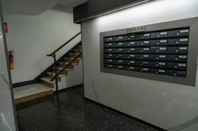 a wall with a sign that reads sidx sidx with stairs at HolidaysBCN Rooms in Barcelona