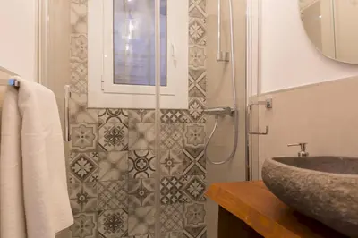 a bathroom with a sink and a shower at Besos Beach Gem 1 By MyRentalHost in Sant Adria de Besos