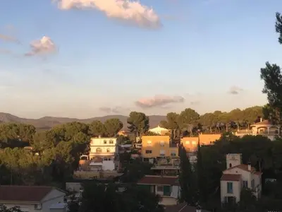 a view of a city with houses and trees at CASA DEL BOSQUE CON PISCINA EN SITGES in Sant Pere de Ribes