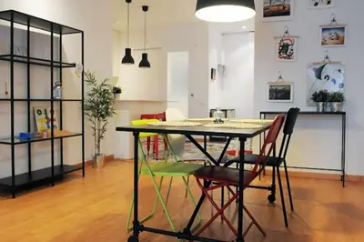 a dining room with a table and two chairs at Calm Modern Apartment in Barcelona