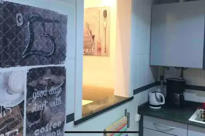 a kitchen with a sink and a counter top at Vive la playa y la noche de Sitges aquí in Sitges