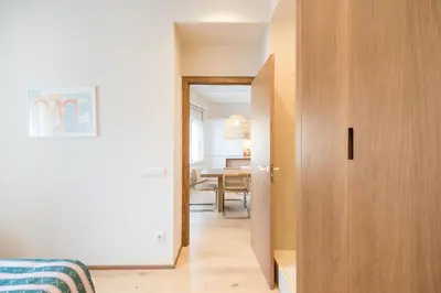 a hallway with a door leading into a room at Mediterranean Retreat with 4-Bedroom, 3-Bath Apartment in Barcelona in Barcelona