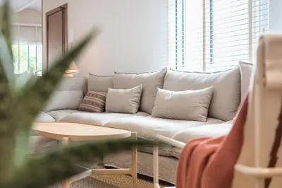 a living room with a couch and a table at Mediterranean Retreat with 4-Bedroom, 3-Bath Apartment in Barcelona in Barcelona