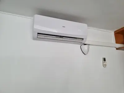a dvr hanging from a wall at Apart 2 habit vistas playa y montaña lift parking in Calella