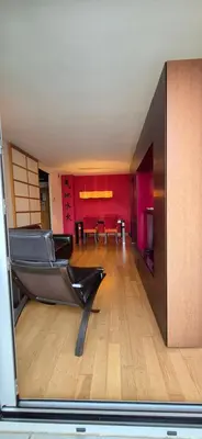 a living room with a leather couch and a dining room at Avenida Diagonal distrito tecnológico 22 arroba - Angeles Terraza in Barcelona