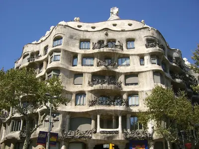 a tall building with balconies on the side of it at MUNTANYA - Apartments & one with Terrace next to Sagrada Familia in Barcelona