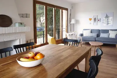 a bowl of fruit on a wooden table in a living room at TERRAVU in Sant Pere de Ribes