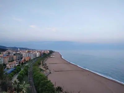 a view of a beach with buildings and the ocean at Bonavista Bright Sea View Studio with Balcony in Calella