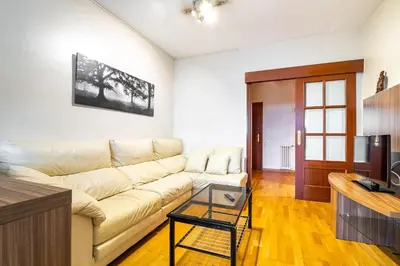 a living room with a couch and a table at Stay U-nique Apartments Marina in Barcelona