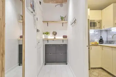 a small kitchen with white walls and a counter at Apartamento Alejandro en BCN in Barcelona