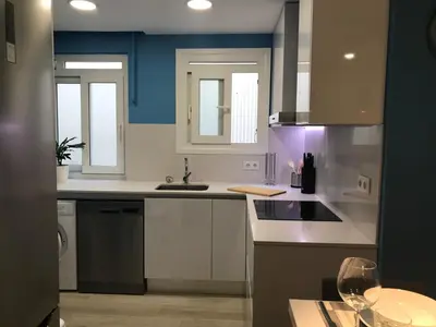 a kitchen with a sink and a stove top oven at Cerdanyola centro in Cerdanyola del Valles
