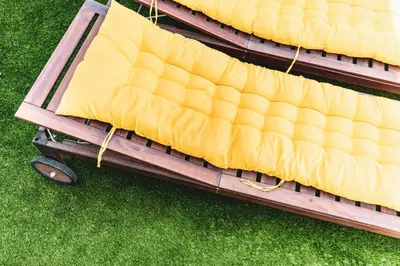an overhead view of a yellow mattress on a table at Bo&Co Apartments in Sitges
