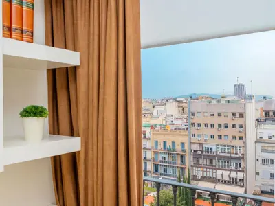 a window with a view of a city at Apartment Centro- Passeig de Gracia - Casa Batllo by Interhome in Barcelona