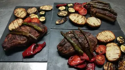 a bunch of different types of meat and vegetables at Hostal Restaurante La Diligencia in Cunit