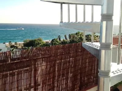 a balcony with a view of the ocean at terraza al mar in Pineda de Mar